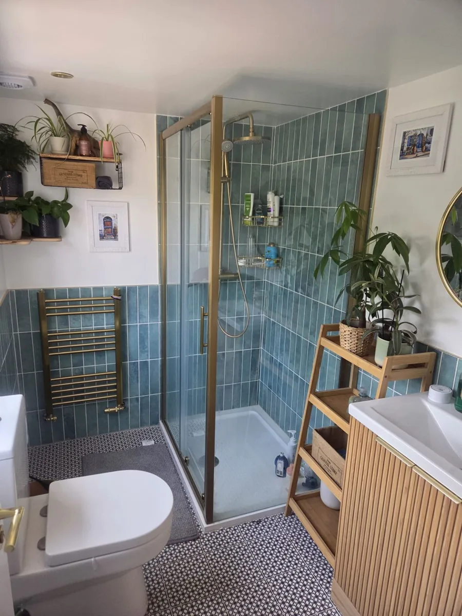 Loft bathroom with blue tiling