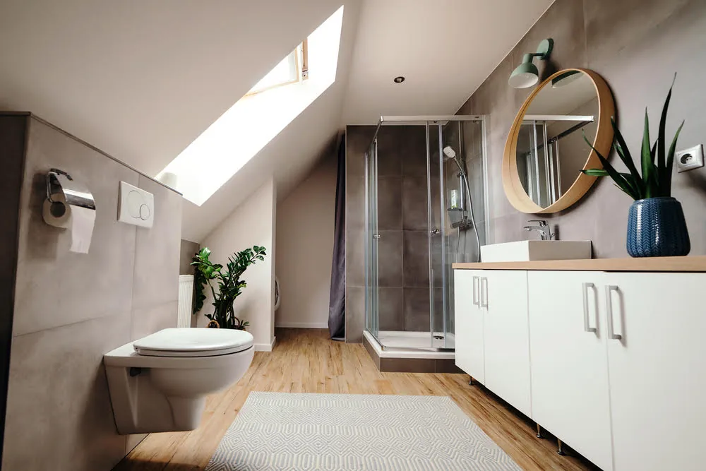 Finished loft extension in Greenwich with natural light across the room