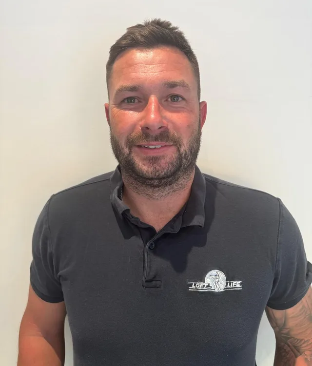 Dave, the owner of Loft Life, in a Loft Life polo shirt