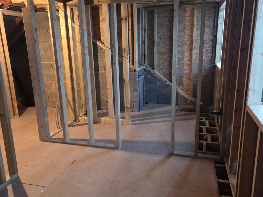 New floor and stud partitions dividing the loft in a Penge dormer conversion