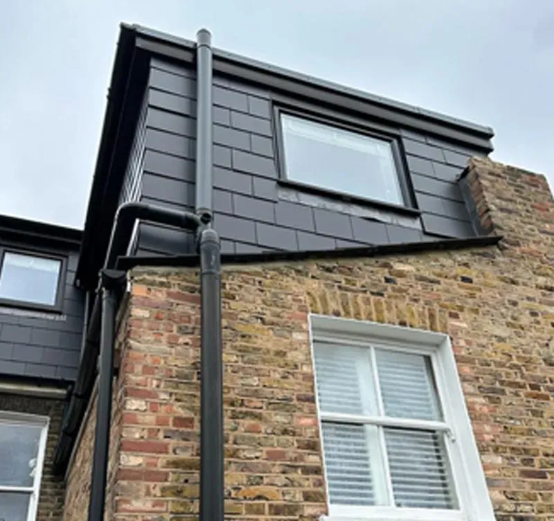 A finished slate-clad dormer on a completed loft conversion